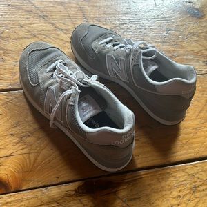 Lightly used gray New Balance 574